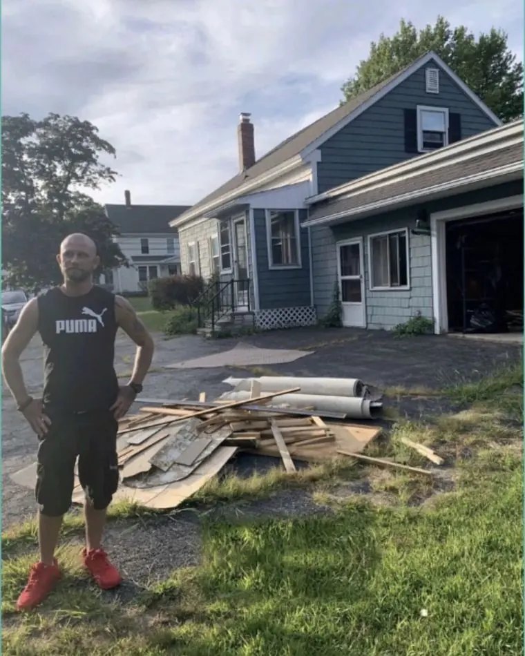Dave Marsh outside a property mid-cleanout